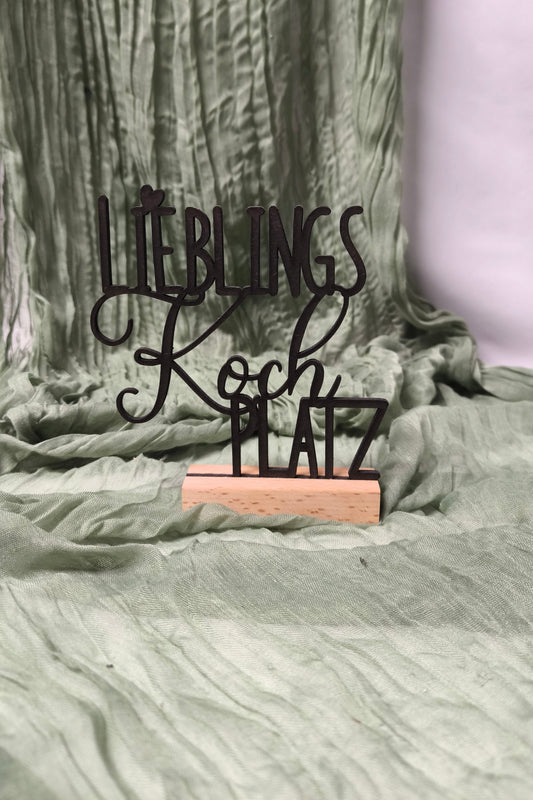 Spruch auf Sockel - Lieblingskochplatz