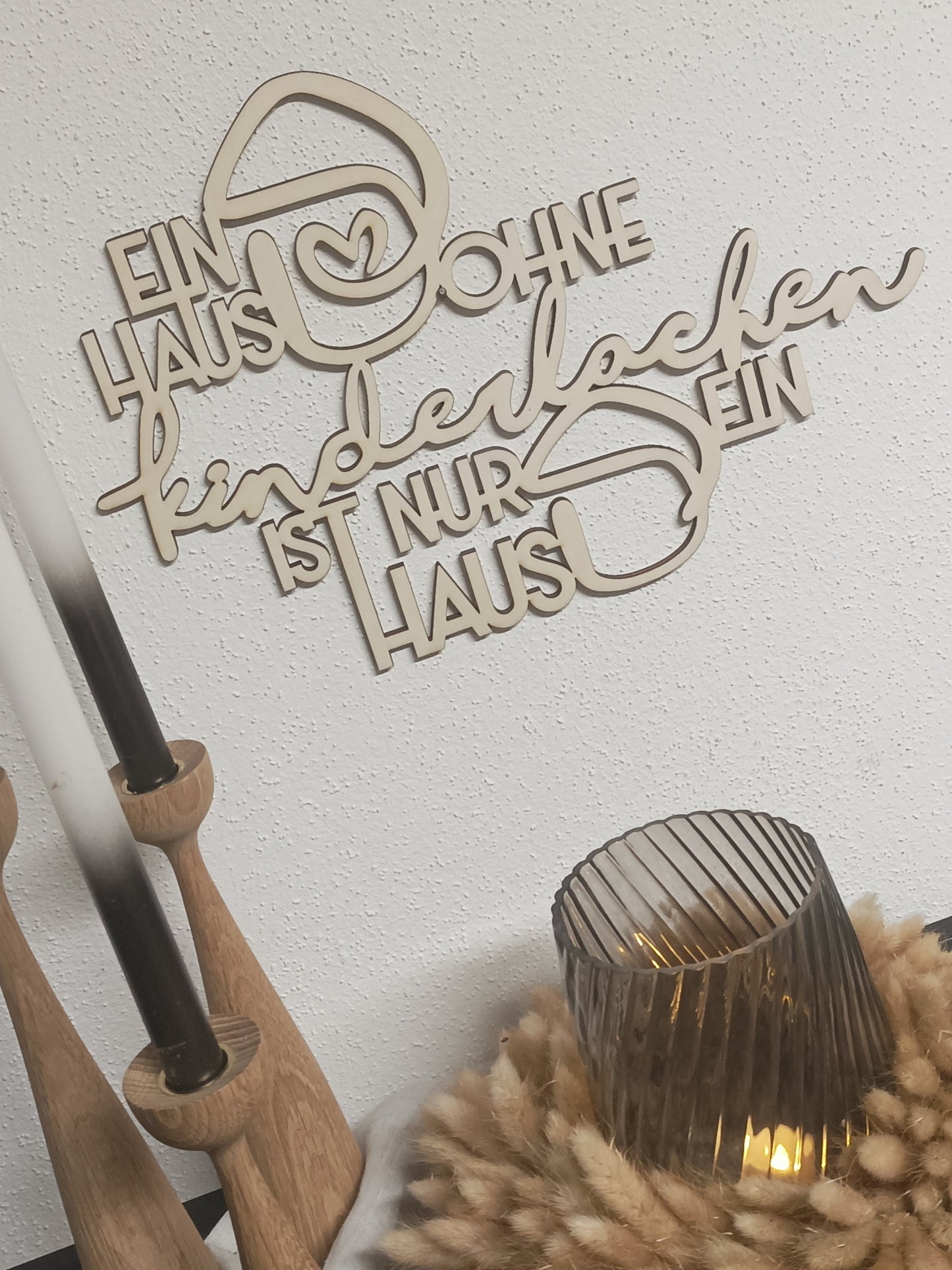 Holzspruch - Ein Haus ohne Kinderlachen